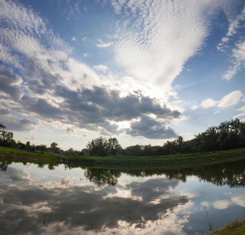 Lake mirror like with dramatic blue sky with cloud 2024 12 06 01 04 18 utc