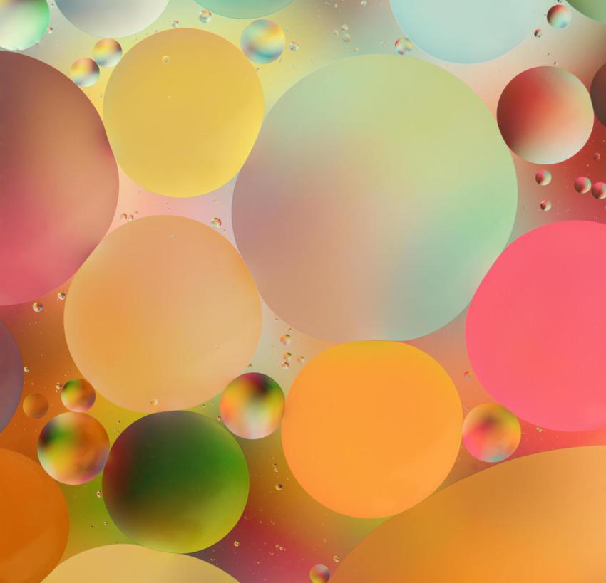 Colorful oil drops on water 2024 10 18 04 47 45 utc