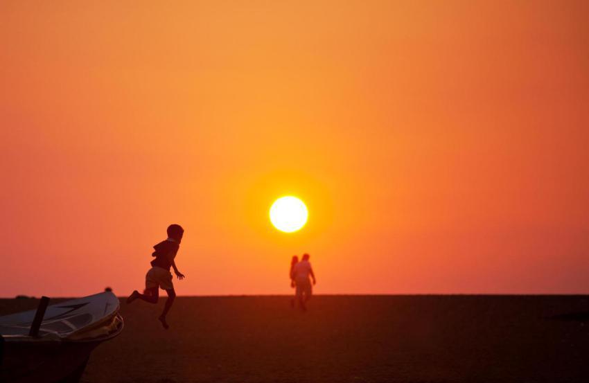 Family on the beach 2023 11 27 05 01 26 utc