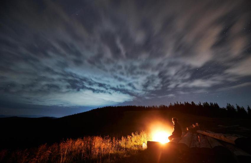 Wide angle view on cloudy starry night in the moun 2023 11 27 05 22 05 utc