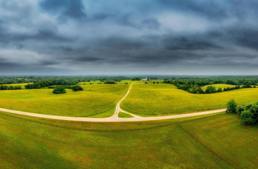 Aerial drone shot of a farm landscape with stormy 2023 11 27 04 56 20 utc