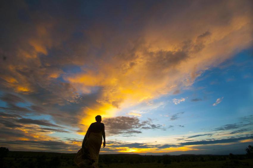 Silhouette of woman enjoying freedom at sunset 2024 09 22 16 40 00 utc