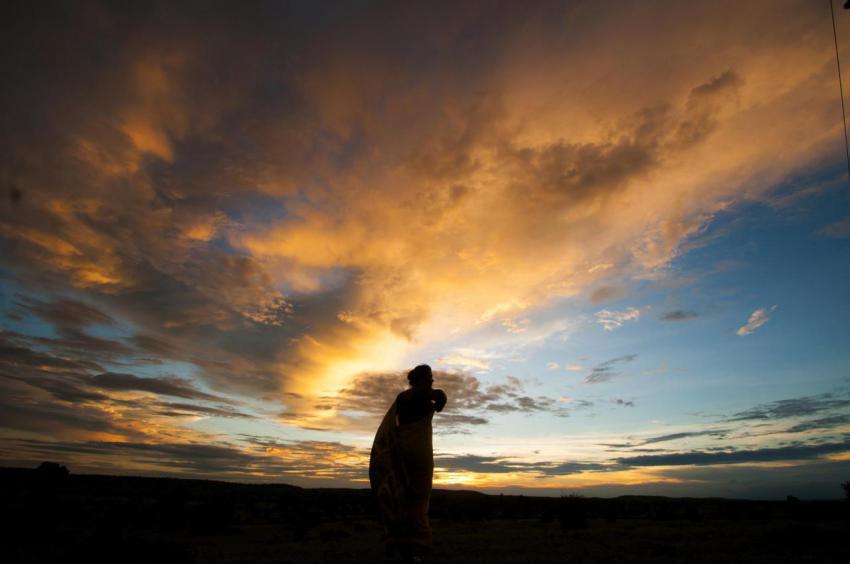 Silhouette of woman enjoying freedom at sunset 2024 09 13 16 37 42 utc