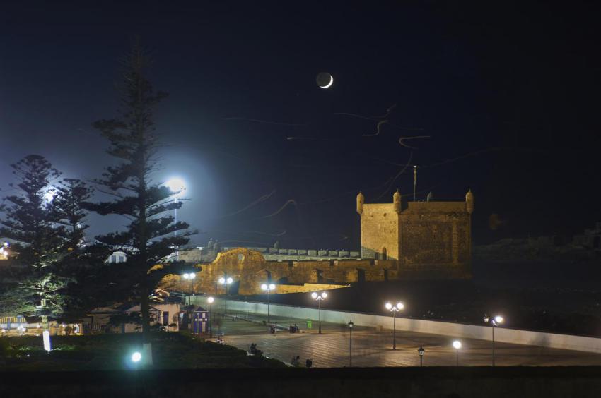 Moonlit fortress by the sea under a starry sky 2024 07 10 20 26 25 utc