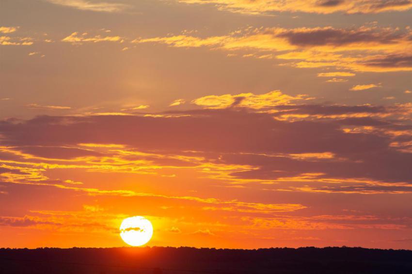 Sunset sky covered with orange puffy clouds in the 2024 12 06 14 46 26 utc