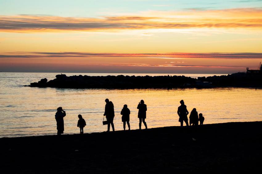 Silhouette of a group of people enjoying a colorfu 2023 11 27 05 11 31 utc