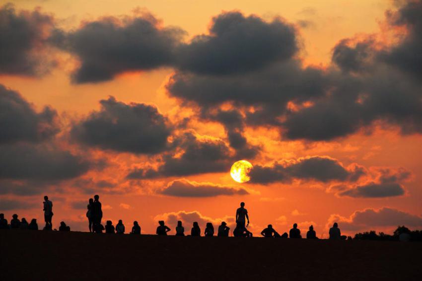 Group of people enjoying the sunset 2023 11 27 05 04 17 utc