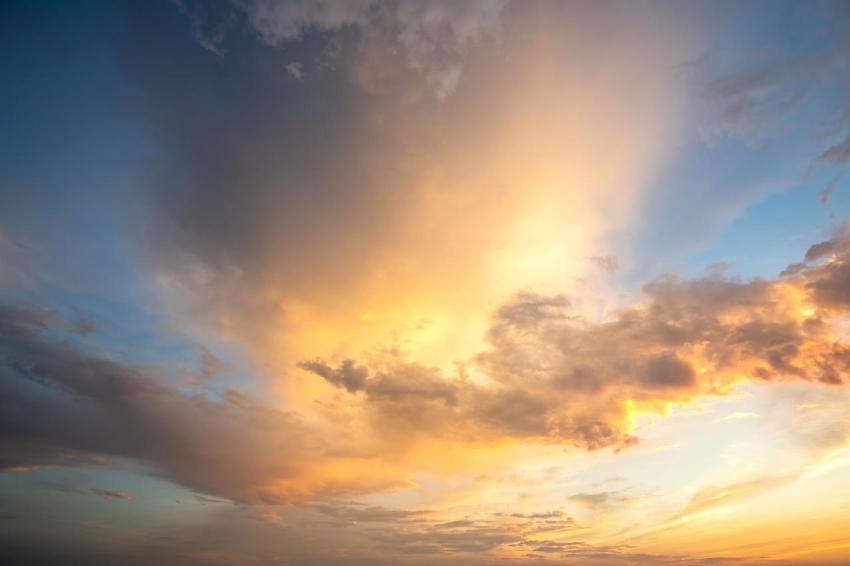 Dramatic cloudy sunset landscape with puffy clouds 2024 12 06 23 15 30 utc
