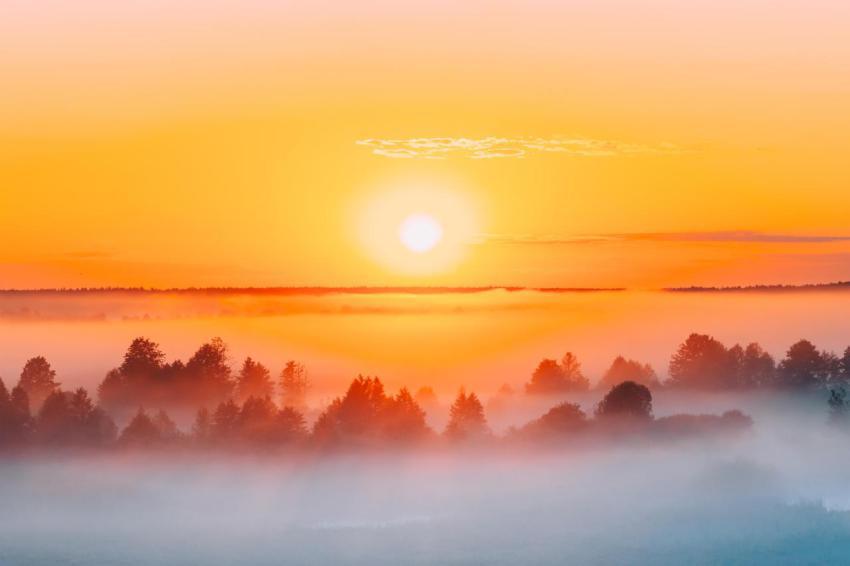 Sunrise over misty landscape scenic view of foggy 2023 11 27 04 53 07 utc