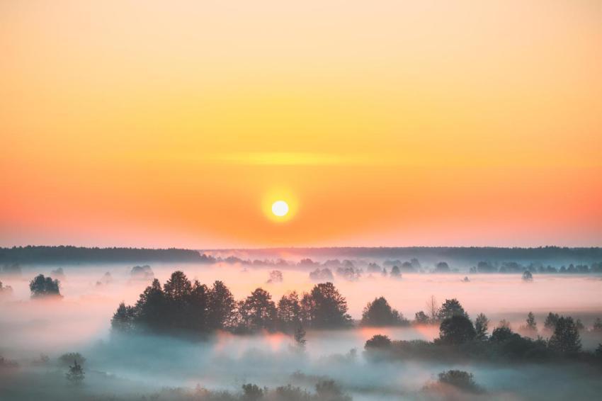 Amazing sunrise sunset over misty landscape sceni 2023 11 27 05 27 14 utc