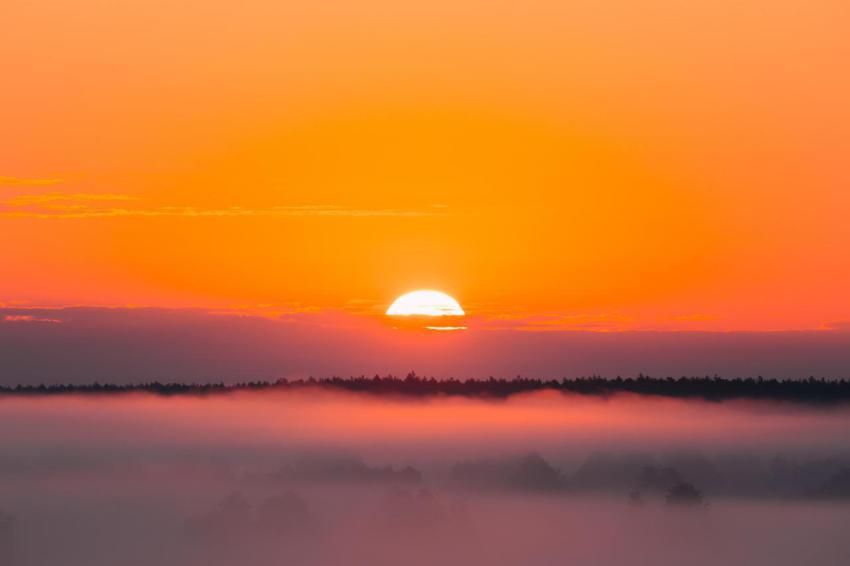 Amazing sunrise over misty landscape scenic view 2023 11 27 05 18 11 utc