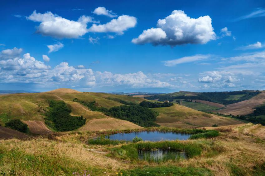 Rural landscape in val d orcia tuscany at summer 2023 11 27 04 56 46 utc