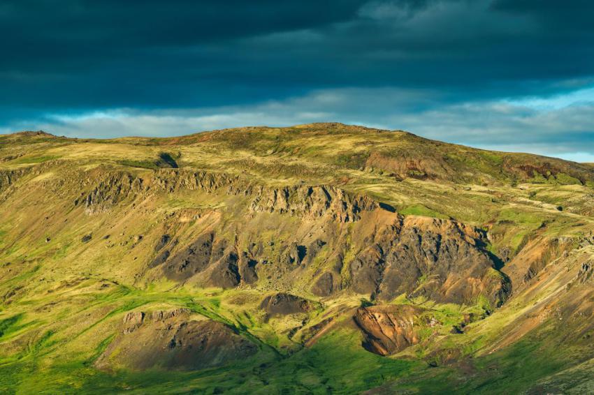 Lush rugged mountain with sunlight shining and moo 2024 11 04 15 19 36 utc