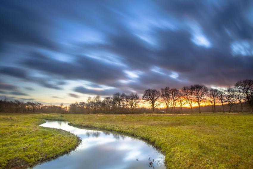 Long exposue orange sunset over river landscape 2023 11 27 04 51 22 utc