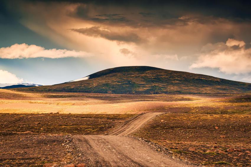 Dirt road through volcanic mountain in remote wild 2024 11 04 15 52 18 utc