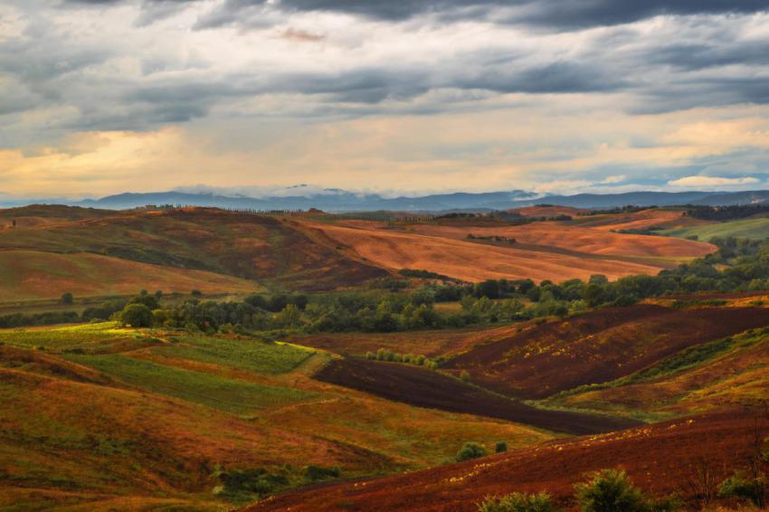 Serene toscany rolling hills under dramatic clouds 2024 07 30 20 51 07 utc