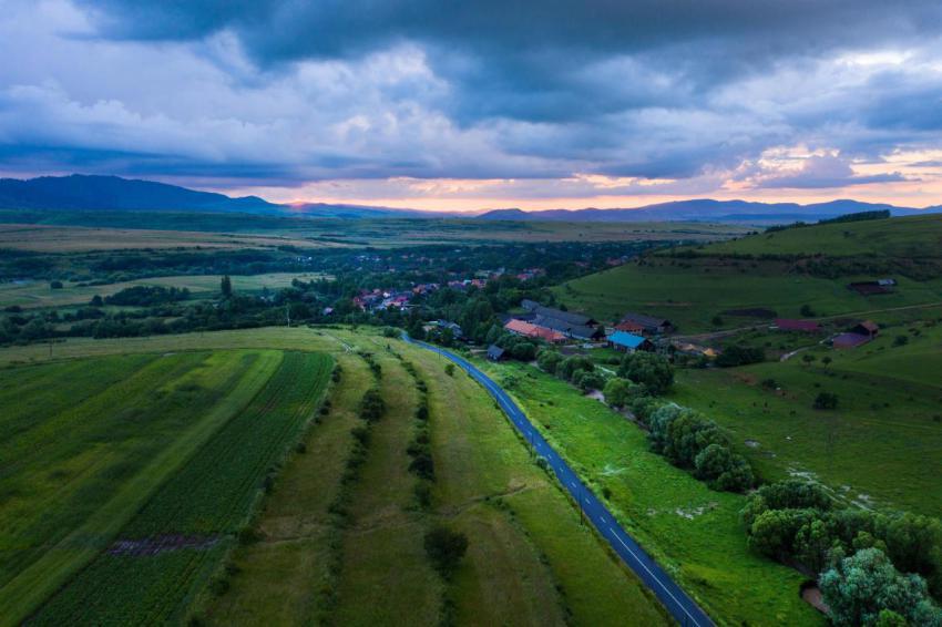Aerial view of a storm and clouds above a village 2023 11 27 05 27 26 utc