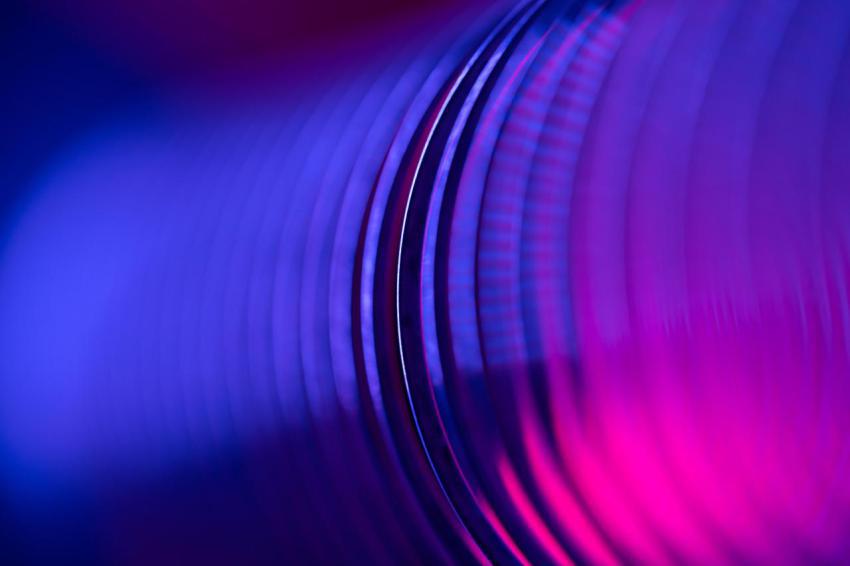Closeup of coiled metal spring rings in a compress 2023 11 27 04 56 43 utc
