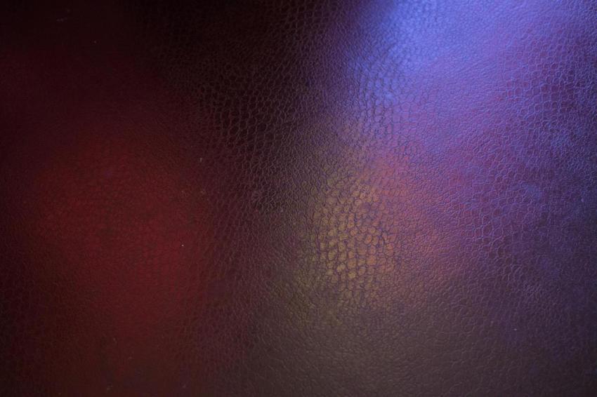 Black leather background with pink and green highl 2023 11 27 05 04 46 utc