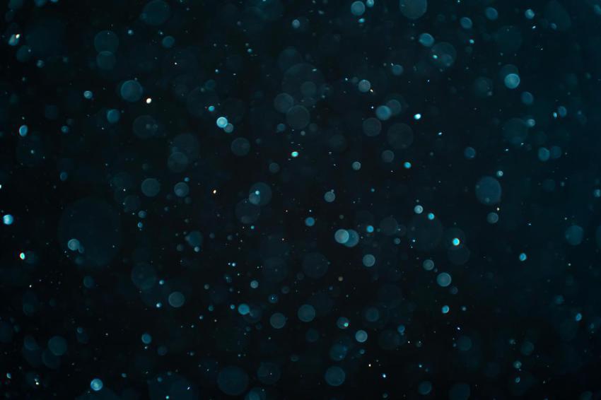 Abstract real dust particles on black background g 2025 01 07 12 06 52 utc