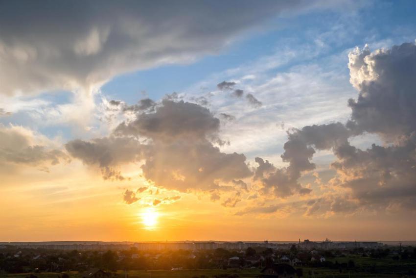 Dramatic sunset landscape of rural area with puffy 2024 12 06 01 10 01 utc