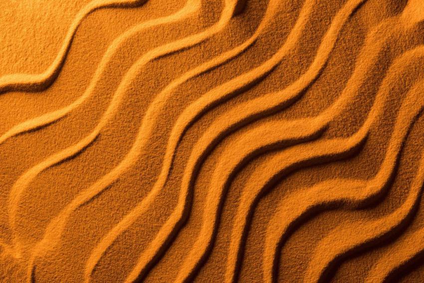 Top view of sandy background with smooth waves and 2024 11 11 05 18 05 utc