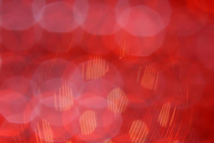 Red wallpaper with light bokeh 2023 11 27 05 32 10 utc