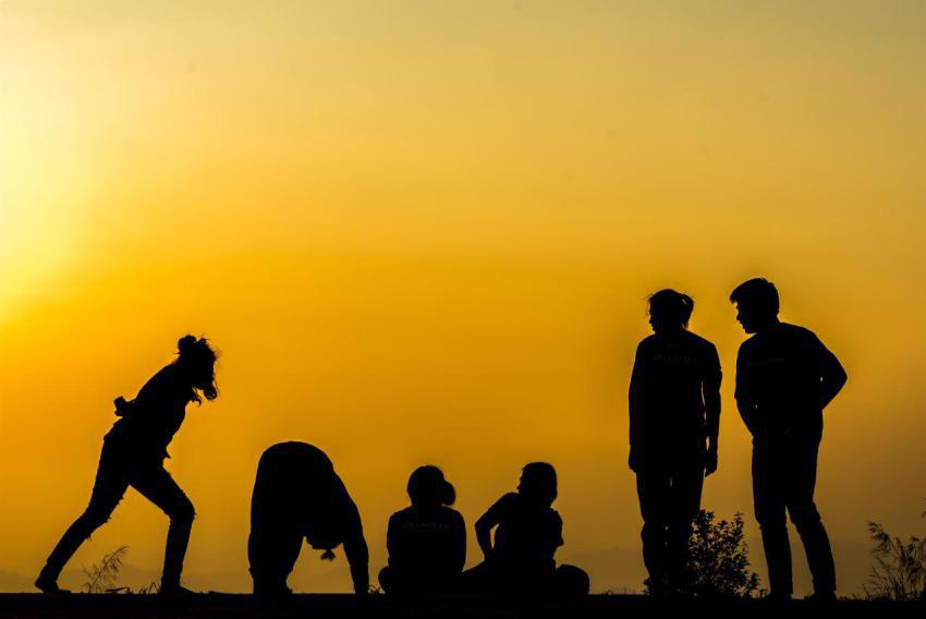 Silhouette of people group practicing yoga on the 2023 11 27 05 19 53 utc