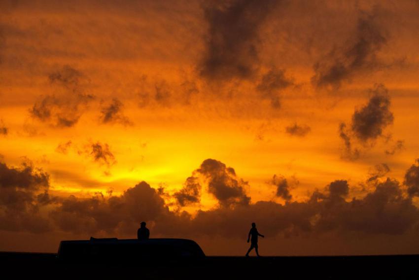 Silhouette of people by the beach 2023 11 27 05 13 01 utc