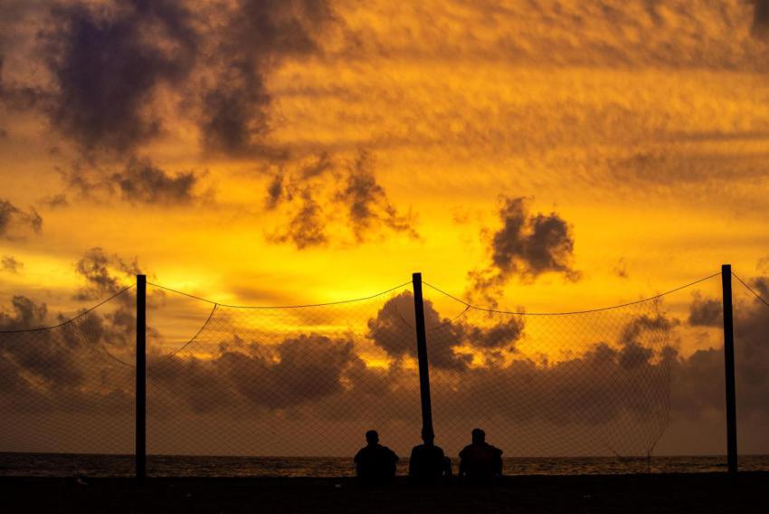 Silhouette of people by the beach 2023 11 27 05 02 34 utc