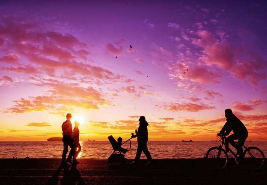 Silhouettes of people enjoying a walk by the seasi 2023 11 27 05 23 36 utc