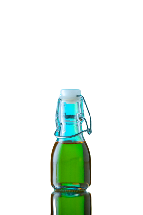 Front view bottle with oil on light blue backgroun 2023 11 27 04 50 42 utc