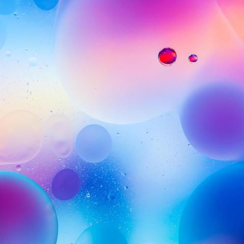 Macro of colorful oil drops on water 2024 10 17 22 54 38 utc