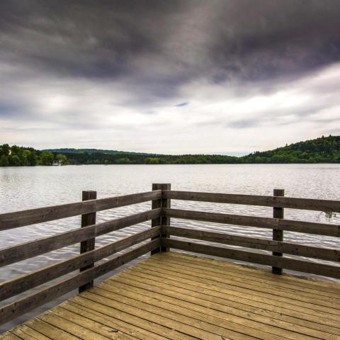 Mesmerizing scenery of the railing on a lake under 2023 11 27 05 20 32 utc